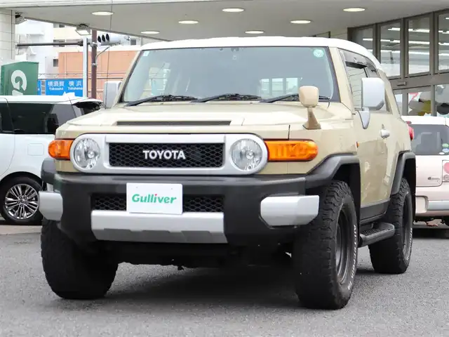 トヨタ ＦＪクルーザー 神奈川県 2013(平25)年 9.6万km ベージュ/ホワイト ドラレコ /ETC/4WD/センサーデフロック/コーナーセンサー/サイドステップ/リアワイパー/社外メモリナビ /Bluetoothオーディオ/DVD/CDナビ/USB入力端子/バックカメラ/フルセグテレビ/クルーズコントロール/ドアバイザー/純正フロアマット/スペアタイヤ/保証書/取説/記録簿(H25/26/27/R1)