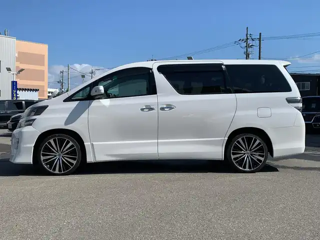 トヨタ ヴェルファイア 2．4Z ゴールデンアイズ 福井県 2012(平24)年 13.6万km ホワイトパールクリスタルシャイン (株)IDOMが運営する【じしゃロン福井店】の自社ローン対象車両になります。こちらは現金またはオートローンご利用時の価格です。自社ローンご希望の方は別途その旨お申付け下さい/社外ナビ（CD・DVD・BT接続可）/フルセグテレビ/バックカメラ/ETC/両側パワースライドドア/クルーズコントロール/オットマン/コーナーセンサー/HID/フォグランプ/フリップダウンモニター