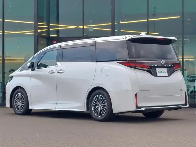 トヨタ ヴェルファイア ハイブリット エグゼクティブ ラウンジ 東京都 2024(令6)年 1.7万km プラチナホワイトパールマイカ 左右独立ムーンルーフ/電動サイドステップ (左右)/JBLプレミアムサウンド/Toyota Safety Sense/・プリクラッシュセーフティ/・レーントレーシングアシスト/・先行車発進告知機能/・オートマチックハイビーム/・レーダークルーズコントロール/・クリアランスソナー/・ロードサインアシスト/・ブラインドスポットモニター/・ヘッドアップディスプレイ/パノラミックビューモニター/アドバンスドパーク/プッシュスタート/パドルシフト/純正ナビ/フルセグTV/リアエンターテインメント/ETC2.0/デジタルインナーミラー/ワイヤレス充電器/両側パワースライドドア/パワーシート/パワーバックドア/レザーシート/シートヒーター/ベンチレーション/ステアリングヒーター/LEDヘッドライト/ドアバイザー/17インチ純正アルミホイール/スマートキー