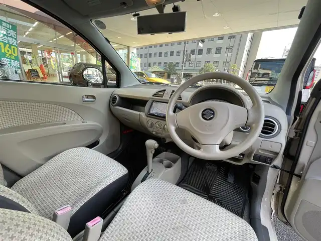 スズキ アルト X 岡山県 2013(平25)年 9.2万km ミルクティーベージュメタリック 登録時走行距離91671キロ/クラリオンナビ/AM/FM/TV/DVD/SD/Bluetooth/バックカメラ/純正フロアマット/ハロゲンライト/ヘッドライトレベライザー/スマートキー/プッシュスタート/ETC