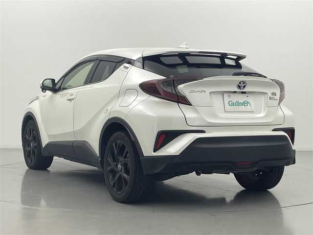 トヨタ Ｃ－ＨＲ G モード ネロ 熊本県 2019(平31)年 7.7万km ホワイトパールクリスタルシャイン 純正ナビ（ＣＤ・ＤＶＤ・フルセグ・ＢＴ・ＳＤ）/バックカメラ　/ビルトインＥＴＣ　/社外前後ドライブレコーダー　/レーダークルーズコントロール　/前後クリアランスソナー　/前席シートヒーター/車線逸脱警報/先行車発進お知らせ機能/ブラインドスポットモニター/横滑り防止/デジタルインナーミラー/ハーフレザーシート/純正フロアマット/純正１８インチAW/オートライト/オートマチックハイビーム/LEDヘッドライト/フォグライト/スマートキー/プッシュスタート/スペアキー1本/保証書/取扱説明書