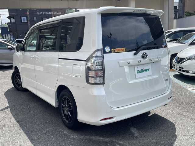 トヨタ ヴォクシー ZS 静岡県 2010(平22)年 7.6万km ホワイトパールクリスタルシャイン 純正ナビ/フルセグTV/DVD/CD/BT/MSV/バックカメラ/両側パワースライドドア/社外16インチAW/パドルシフト/ビルトインETC/HIDヘッドライト/前方ドライブレコーダー/保証書/取扱説明書/H25/27/29/R1/3/5点検記録簿有