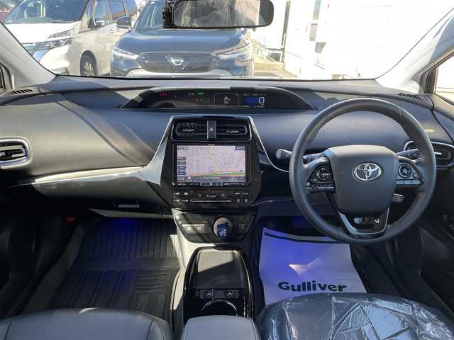 トヨタ プリウス Sツーリングセレクション 石川県 2021(令3)年 5.9万km 黒 アルパイン9型ナビ/フルセグTV/バックカメラ/LEDヘッドライト/ETC/ドライブレコーダー/革シート/シートヒーター/スマートキー/トヨタセーフティセンス/レーダークルーズ/モデリスタエアロ/AC100V/社外アルミホイール/電動ミラー