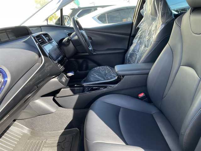 トヨタ プリウス Sツーリングセレクション 石川県 2021(令3)年 5.9万km 黒 アルパイン9型ナビ/フルセグTV/バックカメラ/LEDヘッドライト/ETC/ドライブレコーダー/革シート/シートヒーター/スマートキー/トヨタセーフティセンス/レーダークルーズ/モデリスタエアロ/AC100V/社外アルミホイール/電動ミラー