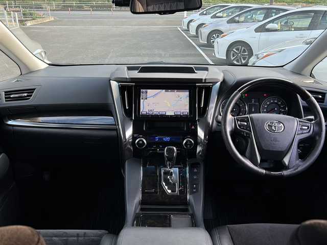 トヨタ ヴェルファイア Z Gエディション 佐賀県 2016(平28)年 14.6万km ホワイトパールクリスタルシャイン ・モデリスタエアロ/・純正9インチナビ/（フルセグ/Bluetooth/DISC/SD/SDREC/AM/FM）/・バックカメラ/・フリップダウンモニター/・ドライブレコーダー/・横滑り防止装置/・LEDヘッドライト/・フォグランプ/・ETC/・両側パワースライドドア/・D/N席パワーシート/・ヒートステアリング/・イルミネーションランプ