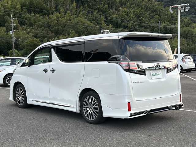 トヨタ ヴェルファイア Z Gエディション 佐賀県 2016(平28)年 14.6万km ホワイトパールクリスタルシャイン ・モデリスタエアロ/・純正9インチナビ/（フルセグ/Bluetooth/DISC/SD/SDREC/AM/FM）/・バックカメラ/・フリップダウンモニター/・ドライブレコーダー/・横滑り防止装置/・LEDヘッドライト/・フォグランプ/・ETC/・両側パワースライドドア/・D/N席パワーシート/・ヒートステアリング/・イルミネーションランプ