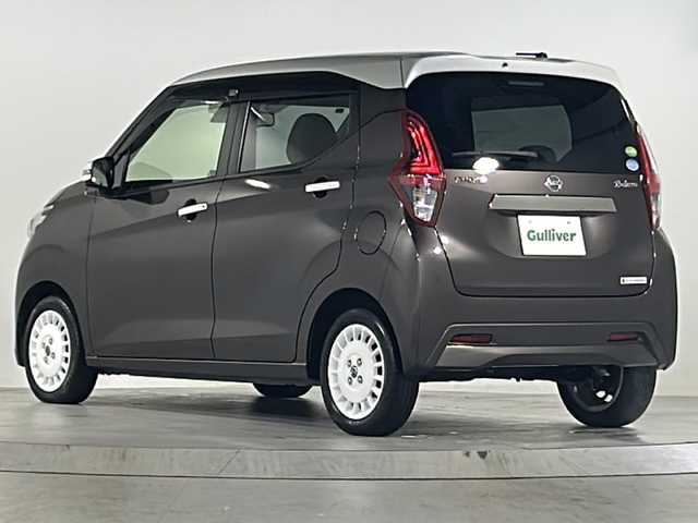 日産 デイズ ボレロ 広島県 2021(令3)年 1.7万km ベージュⅡ 禁煙/カラーコード：W13C22/エマージェンシーブレーキ/車線逸脱警報/ハイビームアシスト/コーナーセンサー/純正９型ナビ（MM320D-L）/・フルセグ/CD/DVD/Bluetooth/AUX/アラウンドビューモニター/革巻きステアリング/ステアリングスイッチ/オートライト/電動格納ウィンカーミラー/ハーフレザーシート/スマートキー/プッシュスタート/純正ドアバイザー