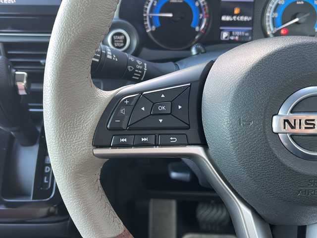 日産 デイズ ボレロ 広島県 2021(令3)年 1.7万km ベージュⅡ 禁煙/カラーコード：W13C22/エマージェンシーブレーキ/車線逸脱警報/ハイビームアシスト/コーナーセンサー/純正９型ナビ（MM320D-L）/・フルセグ/CD/DVD/Bluetooth/AUX/アラウンドビューモニター/革巻きステアリング/ステアリングスイッチ/オートライト/電動格納ウィンカーミラー/ハーフレザーシート/スマートキー/プッシュスタート/純正ドアバイザー