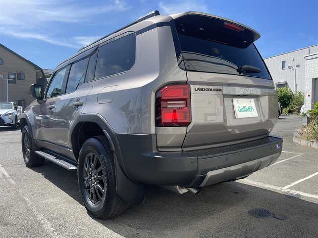 トヨタ ランドクルーザー ２５０ VX 神奈川県 2024(令6)年 0.2万km アバンギャルドブロンズメタリック ワンオーナー/12.3インチディスプレイオーディオ/　・パノラミックビューモニター/　・フルセグTV/BT/AppleCarPlay/AndroidAuto/Toyota Safety Sense/　・プリクラッシュセーフティ/　・LTA＋LDA/　・レーダークルーズコントロール/　・オートマチックハイビーム/　・ロードサインアシスト/　・ドライバー異常時対応システム/　・プロアクティブドライビングシステム/　・発進遅れ告知機能/サンルーフ/前席/　・シートヒーター/　・シートベンチレーション/純正18インチAW/前後ドラレコ/HDMI入力端子/ルーフレール/スマートキー×2/取扱説明書/整備記録簿