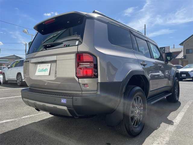 トヨタ ランドクルーザー ２５０ VX 神奈川県 2024(令6)年 0.2万km アバンギャルドブロンズメタリック ワンオーナー/12.3インチディスプレイオーディオ/　・パノラミックビューモニター/　・フルセグTV/BT/AppleCarPlay/AndroidAuto/Toyota Safety Sense/　・プリクラッシュセーフティ/　・LTA＋LDA/　・レーダークルーズコントロール/　・オートマチックハイビーム/　・ロードサインアシスト/　・ドライバー異常時対応システム/　・プロアクティブドライビングシステム/　・発進遅れ告知機能/サンルーフ/前席/　・シートヒーター/　・シートベンチレーション/純正18インチAW/前後ドラレコ/HDMI入力端子/ルーフレール/スマートキー×2/取扱説明書/整備記録簿