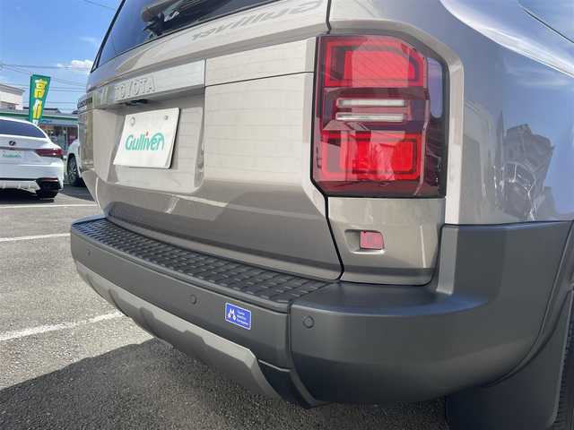 トヨタ ランドクルーザー ２５０ VX 神奈川県 2024(令6)年 0.2万km アバンギャルドブロンズメタリック ワンオーナー/12.3インチディスプレイオーディオ/　・パノラミックビューモニター/　・フルセグTV/BT/AppleCarPlay/AndroidAuto/Toyota Safety Sense/　・プリクラッシュセーフティ/　・LTA＋LDA/　・レーダークルーズコントロール/　・オートマチックハイビーム/　・ロードサインアシスト/　・ドライバー異常時対応システム/　・プロアクティブドライビングシステム/　・発進遅れ告知機能/サンルーフ/前席/　・シートヒーター/　・シートベンチレーション/純正18インチAW/前後ドラレコ/HDMI入力端子/ルーフレール/スマートキー×2/取扱説明書/整備記録簿