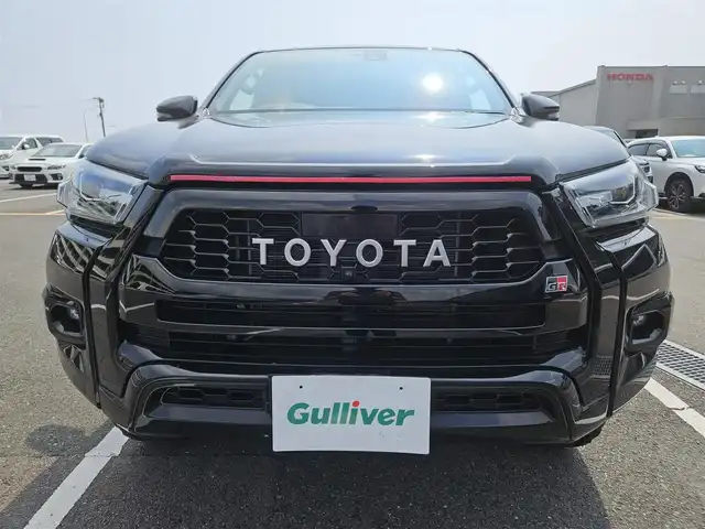 トヨタ ハイラックス Z GRスポーツ 鹿児島県 2022(令4)年 3.4万km アティチュードブラックマイカ 〇純正8インチディスプレイオーディオ＋ナビ/〇バックカメラ/〇パノラマモニター/〇ETC/〇前後ドライブレコーダー/〇トノカバー/〇レーダークルーズコントロール/〇コーナーセンサー/〇プリクラッシュセーフティシステム/〇レーンディバーチャアラート/〇ダウンヒルアシストコントロール/〇ターボ/〇LEDヘッドランプ/〇LEDフロントフォグランプ/〇オートライト/〇左右独立温度調整オートエアコン/〇ハーフレザーシート/〇運転席パワーシート/〇パドルシフト/〇革巻きステアリングホイール/〇純正18インチアルミホイール/〇禁煙車