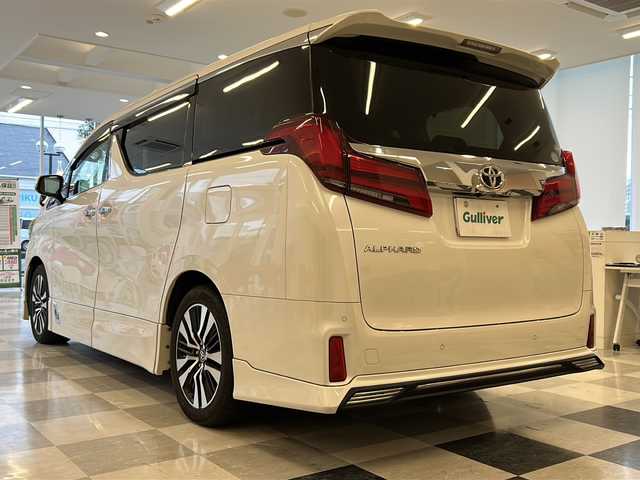 トヨタ アルファード S Cパッケージ 岐阜県 2019(令1)年 6.4万km ホワイトパールクリスタルシャイン ＴＲＤフルエアロ（F/S/R）/サンルーフ/純正9型ナビゲーション/純正フリップダウンモニター/両側電動スライドドア/Bluetooth/フルセグ視聴/３眼LEDヘッドライト/オートライト/オートハイビーム/プッシュスタート/スマートキー/スペアキー/合皮シート/シートヒーター/シートクーラー/前席パワーシート/オットマン/クリアランスソナー/取扱説明書