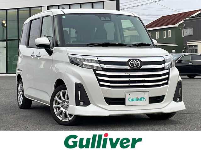 トヨタ ルーミー カスタムG－T 道央・札幌 2021(令3)年 1.4万km パールホワイトⅢ 寒冷地仕様/トヨタセーフティセンス/純正ディスプレイオーディオ/AM/FM/BT/フルセグ/衝突被害軽減ブレーキ/横滑り防止装置/レーダークルーズコントロール/レーンキープアシスト/クリアランスソナー/バックカメラ/サイドカメラ/フロントカメラ/全方位カメラ/アラウンドビューモニター/ビルトインETC/ドライブレコーダー/アイドリングストップ/ワイパーデアイサー/SPORTMODE/両側パワースライドドア/革巻きステアリング/ステアリングリモコン/電動パーキング/ブレーキホールド/プッシュスタート/スマートキー/LEDヘッドライト/オートライト/オートマチックハイビーム/フォグランプ/電動格納ミラー/ウィンカーミラー/純正フロアマット