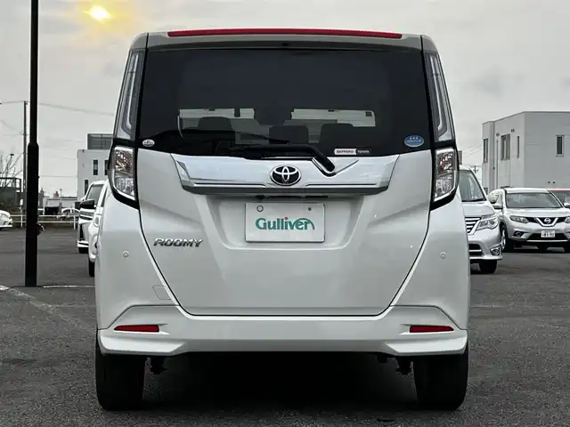 トヨタ ルーミー カスタムG－T 道央・札幌 2021(令3)年 1.4万km パールホワイトⅢ 寒冷地仕様/トヨタセーフティセンス/純正ディスプレイオーディオ/AM/FM/BT/フルセグ/衝突被害軽減ブレーキ/横滑り防止装置/レーダークルーズコントロール/レーンキープアシスト/クリアランスソナー/バックカメラ/サイドカメラ/フロントカメラ/全方位カメラ/アラウンドビューモニター/ビルトインETC/ドライブレコーダー/アイドリングストップ/ワイパーデアイサー/SPORTMODE/両側パワースライドドア/革巻きステアリング/ステアリングリモコン/電動パーキング/ブレーキホールド/プッシュスタート/スマートキー/LEDヘッドライト/オートライト/オートマチックハイビーム/フォグランプ/電動格納ミラー/ウィンカーミラー/純正フロアマット