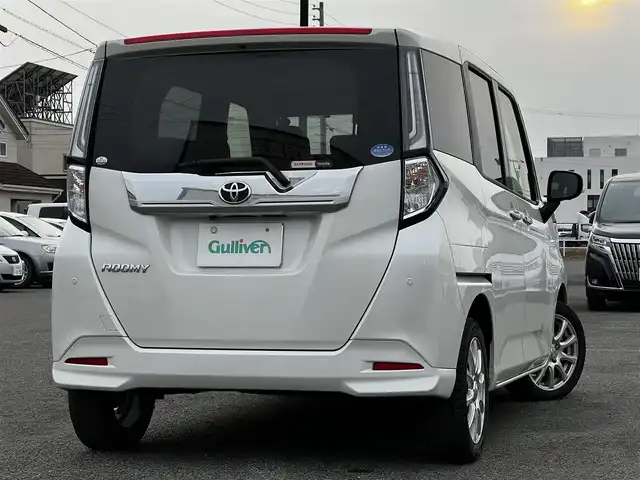 トヨタ ルーミー カスタムG－T 道央・札幌 2021(令3)年 1.4万km パールホワイトⅢ 寒冷地仕様/トヨタセーフティセンス/純正ディスプレイオーディオ/AM/FM/BT/フルセグ/衝突被害軽減ブレーキ/横滑り防止装置/レーダークルーズコントロール/レーンキープアシスト/クリアランスソナー/バックカメラ/サイドカメラ/フロントカメラ/全方位カメラ/アラウンドビューモニター/ビルトインETC/ドライブレコーダー/アイドリングストップ/ワイパーデアイサー/SPORTMODE/両側パワースライドドア/革巻きステアリング/ステアリングリモコン/電動パーキング/ブレーキホールド/プッシュスタート/スマートキー/LEDヘッドライト/オートライト/オートマチックハイビーム/フォグランプ/電動格納ミラー/ウィンカーミラー/純正フロアマット