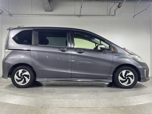 ホンダ フリード ハイブリット ジャストセレクション 神奈川県 2014(平26)年 9.2万km モダンスティールM 純正メモリーナビゲーション/フルセグ　CD DVD　SD　Bluetooth/バックカメラ/両側電動スライドドア/コーナーセンサー/ステアリングスイッチ/ビルトインETC/HIDヘッドライト/オートライト/スマートキー/電格ウインカーミラー/純正フロアマット/純正バイザー