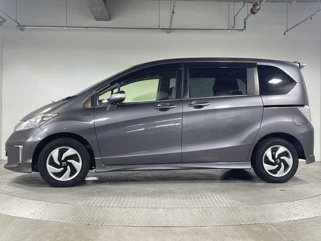 ホンダ フリード ハイブリット ジャストセレクション 神奈川県 2014(平26)年 9.2万km モダンスティールM 純正メモリーナビゲーション/フルセグ　CD DVD　SD　Bluetooth/バックカメラ/両側電動スライドドア/コーナーセンサー/ステアリングスイッチ/ビルトインETC/HIDヘッドライト/オートライト/スマートキー/電格ウインカーミラー/純正フロアマット/純正バイザー