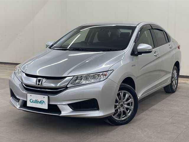 ホンダ グレイス ハイブリッド LX 道央・札幌 2015(平27)年 16万km アラバスターシルバーメタリック 4WD/社外SDナビ/DVD・CD・BT/フルセグTV/クルーズコントロール/車外カメラ（バック・フロント）/ETC/クリアランスソナー/シートヒーター/ECONモード/純正フロアマット/スマートキー/スペアキー（2本）/保証書