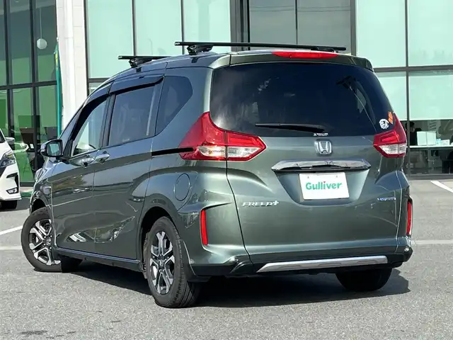 ホンダ フリード＋ ハイブリット クロスター ホンダセンシング 奈良県 2022(令4)年 2.1万km シルバーミストグリーンM 純正SD８インチナビ(VXM-VFNi)/フルセグＴＶ/CD/DVD/iPod/BT/バックカメラ　/両側パワースライドドア　/ドライブレコーダー　/追従型クルーズコントロール　/ハーフレザーシート　/シートヒーター　/ビルトインＥＴＣ　/ルーフレール/ルーフキャリア　/ＬＥＤヘッドライト/オートライト/ホンダセンシング/スマートキー/AAC/ワンオーナー