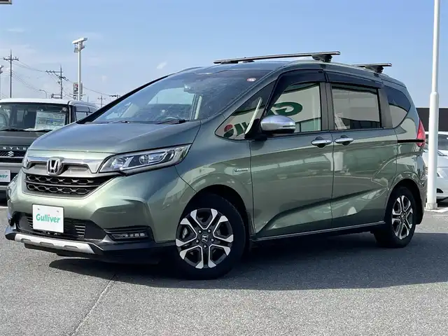 ホンダ フリード＋ ハイブリット クロスター ホンダセンシング 奈良県 2022(令4)年 2.1万km シルバーミストグリーンM 純正SD８インチナビ(VXM-VFNi)/フルセグＴＶ/CD/DVD/iPod/BT/バックカメラ　/両側パワースライドドア　/ドライブレコーダー　/追従型クルーズコントロール　/ハーフレザーシート　/シートヒーター　/ビルトインＥＴＣ　/ルーフレール/ルーフキャリア　/ＬＥＤヘッドライト/オートライト/ホンダセンシング/スマートキー/AAC/ワンオーナー
