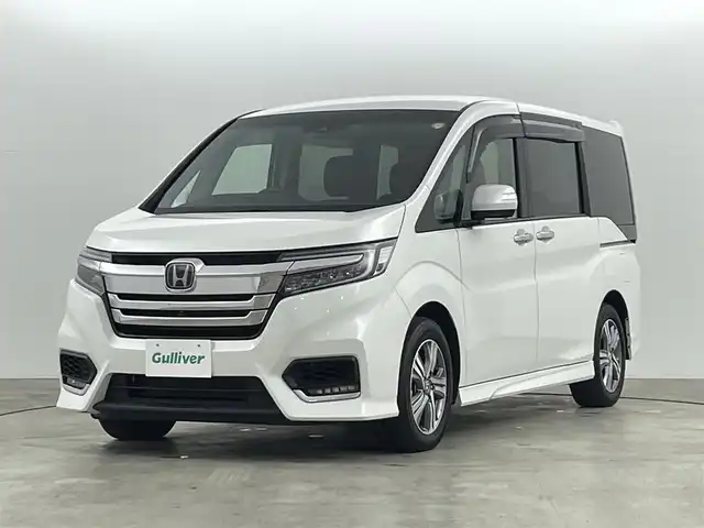 ホンダ ステップワゴン スパーダ eHEV G EXホンダS 福島県 2021(令3)年 2.1万km プラチナホワイトパール ホンダセンシング/・衝突軽減ブレーキ/・路外逸脱抑制/・アダプティブクルーズコントロール/・誤発進抑制機能/・先行車お知らせ/純正10型ナビ/・フルセグTV/・BT.SD.CD/DVD.AM/FM/全周囲カメラ/両側パワースライドドア/ドライブレコーダー（前後）/ハーフレザーシート/シートヒーター(D/N)/純正AW/革巻きステアリング/プッシュスタート/LEDヘッドライト/LEDフォグ/純正フロアマット