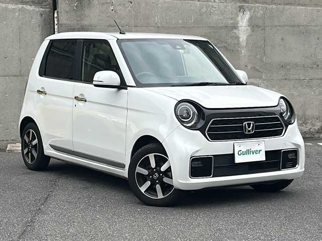 ホンダ Ｎ ＯＮＥ プレミアム 愛知県 2022(令4)年 4.1万km プラチナホワイトパール 社外ナビ/フルセグTV・CD・DVD・SD・Bluetooth/バックカメラ/ホンダセンシング/路外逸脱抑制システム/パーキングセンサーシステム/ビークルスタビリティアシスト/アクティブクルーズコントロール/レーンキーピングアシスト/電子制御パーキングブレーキ/前席シートヒーター/オートブレーキホールド/LEDヘッドライト(オートライト)/LEDフォグランプ/ステアリングスイッチ/充電用USBジャック（急速充電対応タイプ2個＋ギャザズ ナビゲーション接続用USBジャック1個）/ビルドインETC/コムテック製前後ドライブレコーダー/スマートキー/プッシュスタート/純正フロアマット/保証書/取扱説明書/スペアスマートキー
