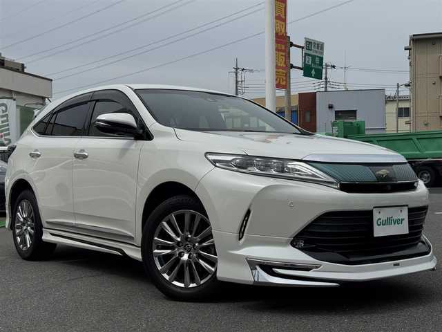 トヨタ ハリアー プログレス 千葉県 2018(平30)年 4.1万km ホワイトパールクリスタルシャイン ワンオーナー/モデリスタエアロ/衝突被害軽減ブレーキ/アダプティブクルーズコントロール/LEDヘッドライト/オートハイビーム/前後コーナーセンサー/カーテンエアバッグ/純正9.2インチSDナビ/Bluetooth/バック＆全方位カメラ/フルセグTV/AM＆FMラジオ/ETC2.0/前後純正ドライブレコーダー/純正フロアマット/ハーフレザーシート/D席パワーシート/純正18インチアルミホイール/プッシュスタート/スマートキー/スペアキー/取扱説明書＆保証書/令和7年記録簿