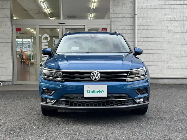 フォルクスワーゲン ティグアン TDI 4モーション ハイライン 埼玉県 2019(令1)年 6.6万km 青Ｍ 純正ナビ/フルセグTV/FM/AM/BT/App Connect、Android Auto、Mirror Link/純正ドラレコ前後/ビルトインETC2.0/バックカメラ/全周囲カメラ/クルーズコントロール 追従機能あり/レーンキープ/パワーバックドア/MT機能付きAT/パドルシフト/パーキングアシスト/シートヒーター(前席、後席)/社外ルーフBOX/レール（THULE）/サマータイヤ（Continental） タイヤのみ/全席オートPW/ステアリングリモコン/プッシュスタート/モード切替（エコ/ノーマル/スポーツ/雪/オフロード）/USB×3(前席×2、後席×1)/シガソケ12V/オートライト/スマートキー×2