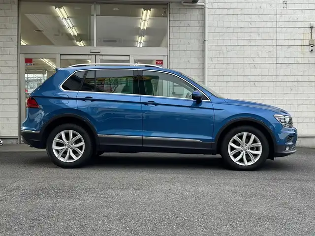 フォルクスワーゲン ティグアン TDI 4モーション ハイライン 埼玉県 2019(令1)年 6.6万km 青Ｍ 純正ナビ/フルセグTV/FM/AM/BT/App Connect、Android Auto、Mirror Link/純正ドラレコ前後/ビルトインETC2.0/バックカメラ/全周囲カメラ/クルーズコントロール 追従機能あり/レーンキープ/パワーバックドア/MT機能付きAT/パドルシフト/パーキングアシスト/シートヒーター(前席、後席)/社外ルーフBOX/レール（THULE）/サマータイヤ（Continental） タイヤのみ/全席オートPW/ステアリングリモコン/プッシュスタート/モード切替（エコ/ノーマル/スポーツ/雪/オフロード）/USB×3(前席×2、後席×1)/シガソケ12V/オートライト/スマートキー×2
