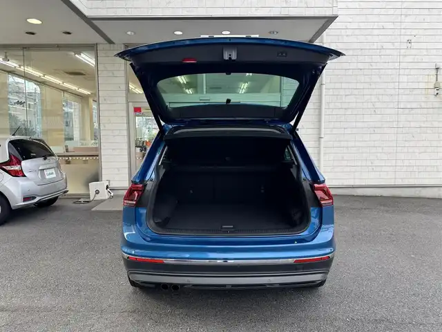 フォルクスワーゲン ティグアン TDI 4モーション ハイライン 埼玉県 2019(令1)年 6.6万km 青Ｍ 純正ナビ/フルセグTV/FM/AM/BT/App Connect、Android Auto、Mirror Link/純正ドラレコ前後/ビルトインETC2.0/バックカメラ/全周囲カメラ/クルーズコントロール 追従機能あり/レーンキープ/パワーバックドア/MT機能付きAT/パドルシフト/パーキングアシスト/シートヒーター(前席、後席)/社外ルーフBOX/レール（THULE）/サマータイヤ（Continental） タイヤのみ/全席オートPW/ステアリングリモコン/プッシュスタート/モード切替（エコ/ノーマル/スポーツ/雪/オフロード）/USB×3(前席×2、後席×1)/シガソケ12V/オートライト/スマートキー×2