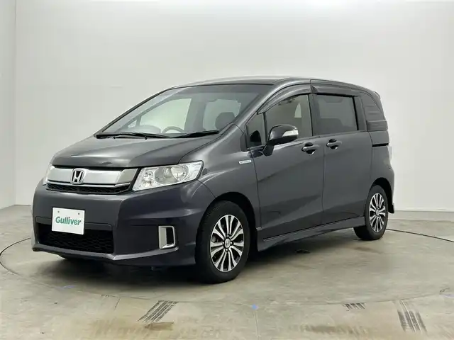 ホンダ フリード スパイク ハイブリット ジャストセレクション 岡山県 2015(平27)年 7.2万km グラマラスモーブP 純正ナビ/VXM-152VFi/(CD/DVD/TV/BT)/バックカメラ/両側パワースライドドア/HIDヘッドライト/オートライト/ビルトインETC/純正15インチアルミ/クルーズコントロール/社外フロアマット/ドアバイザー/スマートキー×1