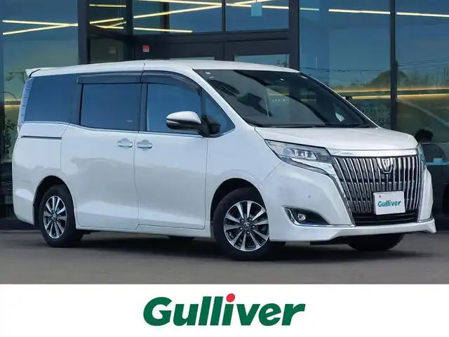 トヨタ エスクァイア Gi プレミアムパッケージ 東京都 2018(平30)年 3.5万km ホワイトパールクリスタルシャイン 純正10インチナビ(NSZN-Z66T)/【AM/FM/DISC/SD/TV/BT】/純正12インチフリップダウンモニター/ビルトインETC2.0/ドライブレコーダー/バックカメラ/クルーズコントロール/両側電動スライドドア/プリクラッシュセーフティ/レーンディパーチャーアラート/アイドリングストップ/ステアリングヒーター/シートヒーター/ハーフレザーシート/コーナーセンサー/LEDヘッドライト/フォグランプ/プッシュスタート/スマートキー/スペアキー×１