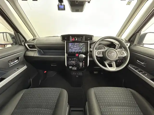 トヨタ ルーミー カスタムG 道央・札幌 2021(令3)年 1.8万km ブラックマイカメタリック/ブリリアントカッパークリスタルマイカ 2トーン ・４WD/・寒冷地仕様/・ディーラーオプション９インチSDナビ/・CD/DVD/BT/SD/フルセグTV/・バックカメラ/・ステアリングスイッチ/・ビルトインETC/・スマートアシスト/・プリクラッシュセーフティ/・レーンキープアシスト/・レーダークルーズコントロール/・アイドリングストップ/・電動パーキングブレーキ/・ブレーキホールド/・両側パワースライドドア/・D席＋N席ヒートヒーター/・２列目サンシェード/・シートバックテーブル/・オートマチックハイビーム/・オートライト/・LEDヘッドライト/・LEDフォグランプ/・LEDデイライト/・ドアミラーウィンカー/・オートリトラクタブルドアミラー/・ドアバイザー/・純正フロアマット/・プッシュスタート/・スマートキー/・純正１４インチAW（夏）