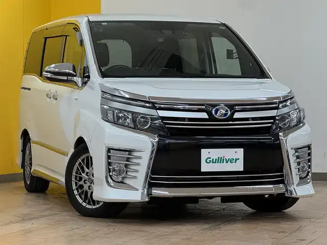 トヨタ ヴォクシー ハイブリッド ZS 煌Ⅱ 群馬県 2017(平29)年 3.7万km ホワイトパールクリスタルシャイン トヨタセーフティセンス/プリクラッシュセーフティ/レーンキープアシスト/オートマチックハイビーム/ALPINE10型ナビ/　フルセグ/BT/CD/DVD/SD/ALPINE12.8型後席モニター/両側パワースライドドア/バックカメラ/LEDヘッドライト/フォグランプ/社外デジタルインナーミラー/ドライブレコーダー/ETC/純正16インチAW/プッシュスタート/スマートキー