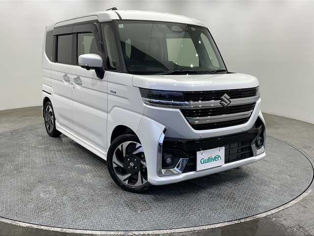 スズキ スペーシア カスタム HYBRID XS 栃木県 2024(令6)年 0.2万km ピュアホワイトP 純正ナビ/　（Bluetooth/フルセグTV/ApplecarPlay）/バックカメラ/アラウンドビューモニター/スズキセーフティサポート/・デュアルセンサーブレーキサポートII/・誤発進抑制機能/・車線逸脱抑制機能/・車線逸脱警報機能/・ふらつき警報機能/・低速時ブレーキサポート/・発進お知らせ機能/・標識認識機能/・ハイビームアシスト/コーナーセンサー/ビルトインETC/両側パワースライドドア/前席シートヒーター/ステアリングヒーター/純正AW