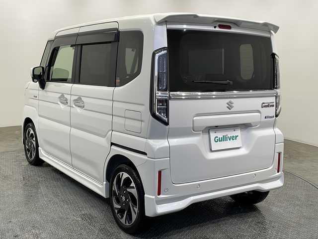 スズキ スペーシア カスタム HYBRID XS 栃木県 2024(令6)年 0.2万km ピュアホワイトP 純正ナビ/　（Bluetooth/フルセグTV/ApplecarPlay）/バックカメラ/アラウンドビューモニター/スズキセーフティサポート/・デュアルセンサーブレーキサポートII/・誤発進抑制機能/・車線逸脱抑制機能/・車線逸脱警報機能/・ふらつき警報機能/・低速時ブレーキサポート/・発進お知らせ機能/・標識認識機能/・ハイビームアシスト/コーナーセンサー/ビルトインETC/両側パワースライドドア/前席シートヒーター/ステアリングヒーター/純正AW