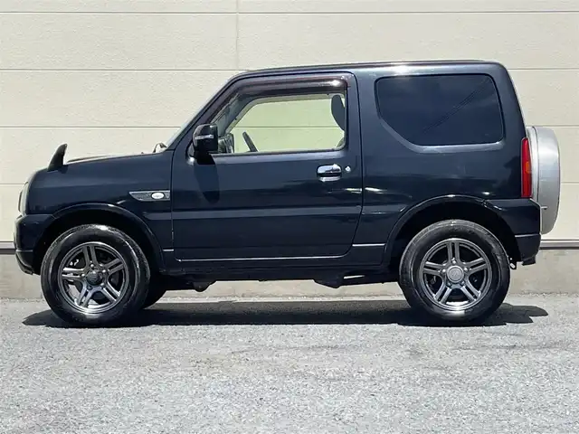 スズキ ジムニー ランドベンチャー 茨城県 2014(平26)年 9.5万km ブルーイッシュブラックパール3 ４WD/背面タイヤ/AW純正/社外ナビ/ワンセグテレビ/ハロゲンヘッドライト/リモコンキー/スペアキー/シートヒーター/ミラーヒーター/ハーフレザーシート/パワステ/パワーウィンドウ/ABS/ETC