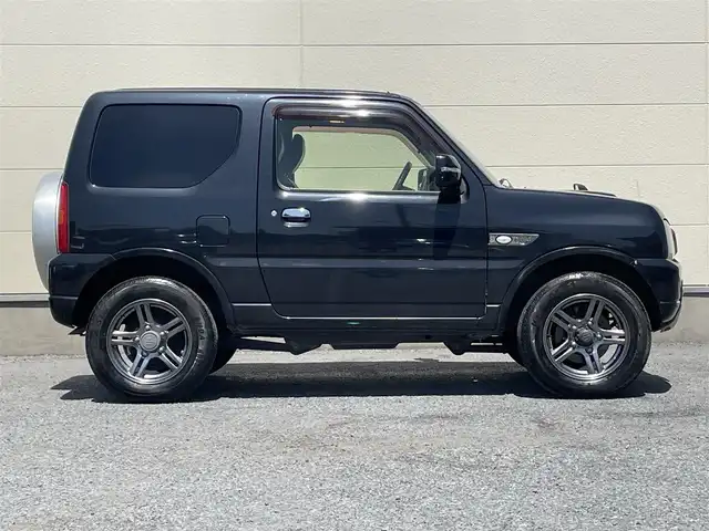 スズキ ジムニー ランドベンチャー 茨城県 2014(平26)年 9.5万km ブルーイッシュブラックパール3 ４WD/背面タイヤ/AW純正/社外ナビ/ワンセグテレビ/ハロゲンヘッドライト/リモコンキー/スペアキー/シートヒーター/ミラーヒーター/ハーフレザーシート/パワステ/パワーウィンドウ/ABS/ETC