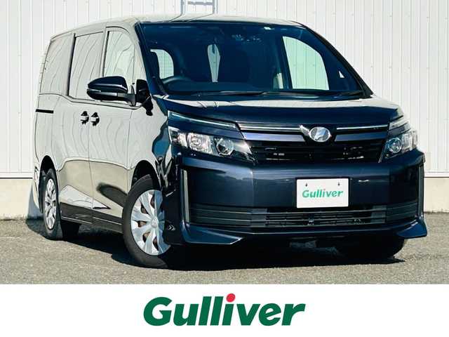 トヨタ ヴォクシー X 熊本県 2017(平29)年 5.9万km ダークバイオレットマイカメタリック ワンオーナー/純正ＳＤナビ/AM/FM/CD/DVD/SD/SDREC/Bluetooth/フルセグTV/トヨタセーフティセンス/・先行車発信告知機能/・レーンディパーチャーアラート/・スマートストップシステム/バックカメラ/ドライブレコーダー/フリップダウンモニター/両側パワースライドドア/ロールサンシェード/ステアリングスイッチ/ビルトインETC/電動格納ミラー/・ウィンカーミラー/LEDヘッドライト/・オートライト/MTモード付AT/皮調シートカバー/プッシュスタート/スマートキー/・スペアキー/純正フロアマット