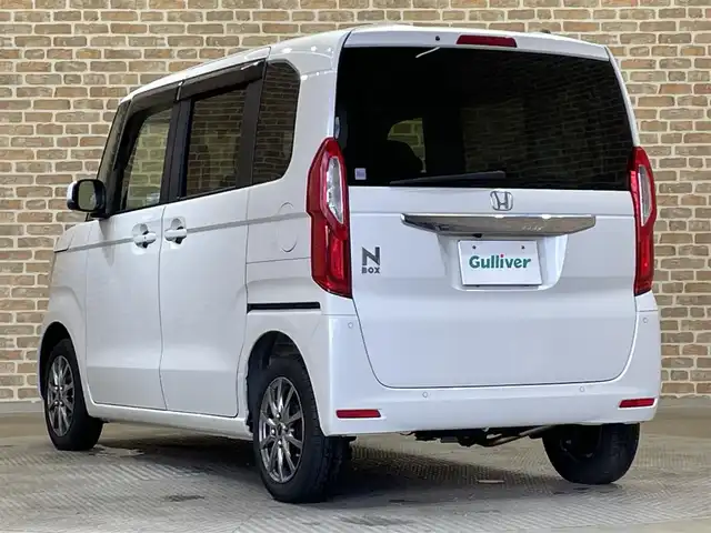 ホンダ Ｎ ＢＯＸ L 岩手県 2023(令5)年 2.1万km プラチナホワイトパール ４WD/左側パワースライドドア/ホンダセンシング/衝突軽減ブレーキ/路外逸脱抑制機能/渋滞追従機能付きアダプティブクルーズコントロール/車線維持支援機能/パーキングセンサー/標識認識機能/先行車発信お知らせ機能/ふらつき警報機能/オートハイビーム/オートブレーキホールド/横滑り防止装置/アイドリングストップ/シートバックテーブル/シートヒーター/ロールサンシェード/チップアップリアシート/カロッツェリアナビ/フルセグTV/バックカメラ/ETC/ヘッドライトレベライザー/LEDヘッドライト/社外14インチアルミホイール
