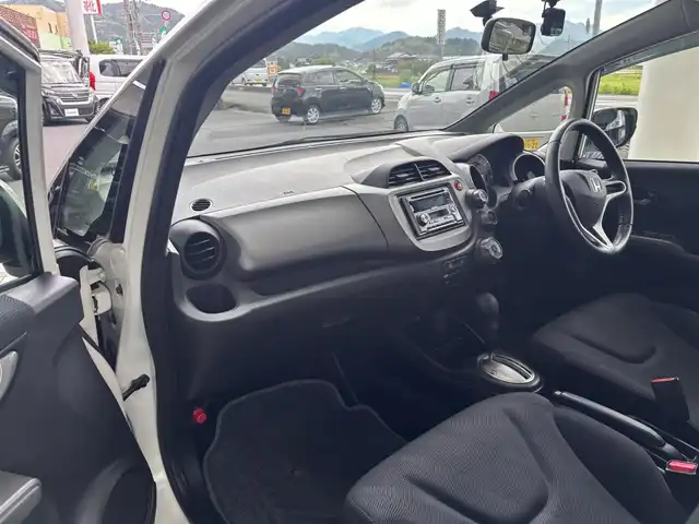 ホンダ フィット スポーティエディション 京都府 2010(平22)年 6.3万km プレミアムホワイトパール ワンオーナー/オートライト/ディスチャージ/KENWOODドライブレコーダー/キーレス/社外CD、カセットデッキ/純正15インチアルミホイール/保証書/取扱説明書