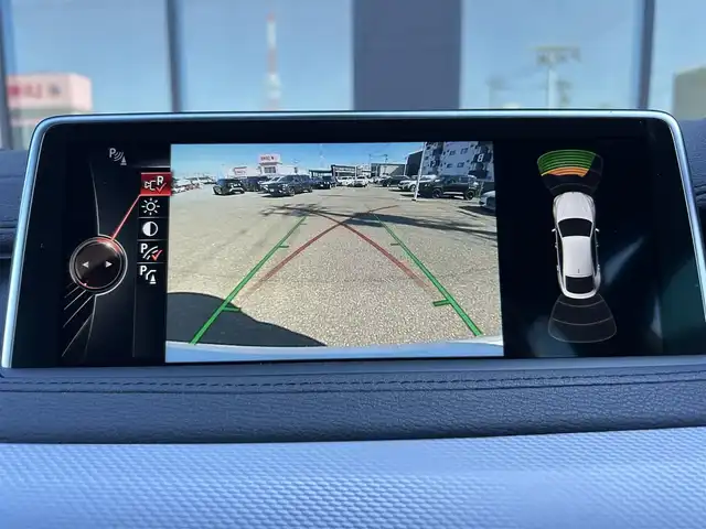 ＢＭＷ Ｘ６ xDrive35i Mスポーツ 石川県 2016(平28)年 4.3万km 白 4WD/インテリジェントセーフティ/サンルーフ/純正ナビ/　Bluetooth・AM/FM・CD・DVD・USB・AUX/フルセグTV/ミラーETC/全方位カメラ/アダプティブクルーズコントロール/ブラインドスポットモニター/パワーバックドア/シートヒーター（D+N席）/パワーシート（D+N席）/シートメモリー/アンチロック・ブレーキ・システム/横滑り防止装置/インテリジェントAFS/盗難防止装置/ダウンヒルアシストコントロール/純正アルミホイール/スマートキー