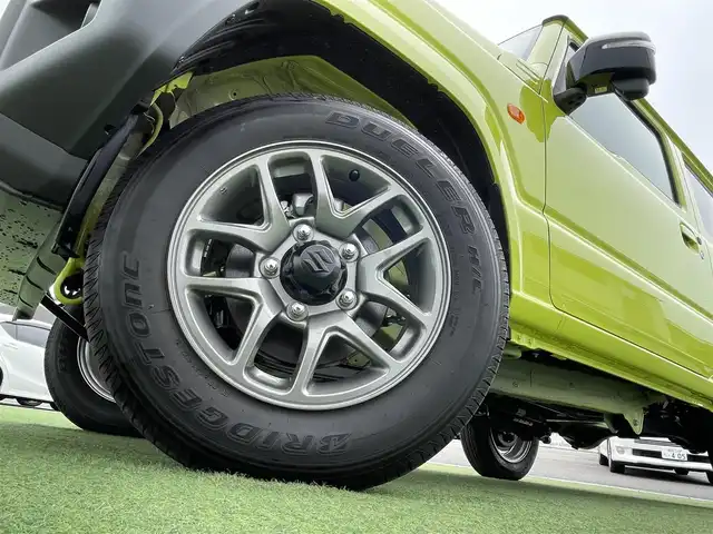 スズキ ジムニー XC 香川県 2025(令7)年 0.1万km未満 キネティックイエロー 登録時走行距離：14km/ワンオーナー/デュアルセンサーブレーキサポート/誤発進抑制機能/車線逸脱警報機能/ふらつき警報機能/ハイビームアシスト/先行車発進お知らせ機能/コーナーセンサー/シートヒーター/LEDヘッドライト/純正フロアマット/純正16インチAW/スマートキー×２/アイドリングストップ/保証書/取扱説明書
