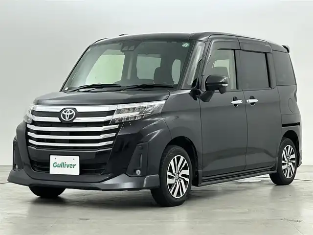 トヨタ ルーミー カスタムG 福岡県 2021(令3)年 2万km ブラックマイカメタリック 純正ナビ（ＢＴ，フルセグＴＶ）　/バックカメラ　/ビルトインＥＴＣ　/前方ドラレコ　/ＡＣＣ　/コーナーセンサー　/衝突被害軽減ブレーキ　/レーンキープ　/アイドリングストップ　/シートヒーター　/両側電動スライドドア