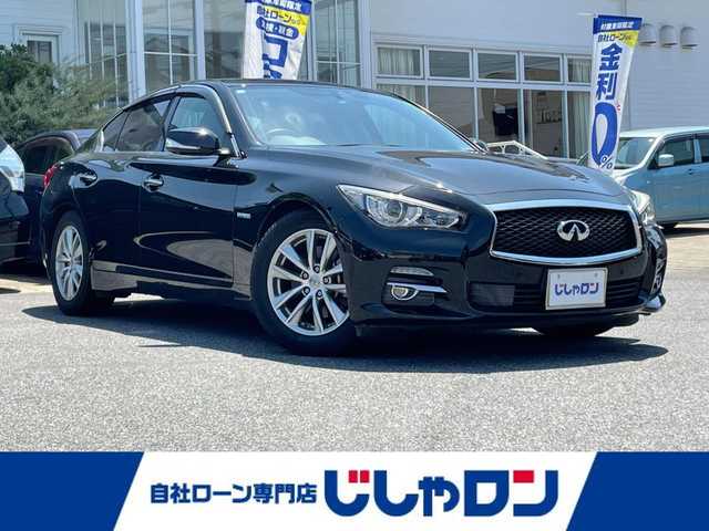 日産 スカイライン ハイブリッド 350GT Type P 愛知県 2016(平28)年 12.8万km メテオフレークブラックパール (株)IDOMが運営する【じしゃロン名古屋鳴海店】の自社ローン専用車両になりますこちらは現金またはオートローンご利用時の価格です。自社ローンご希望の方は別途その旨お申付け下さい/ワンオーナー/純正ナビ/レーダークルーズコントロール/レザーシート/パワーシート/メモリーシート/シートヒーター/純正１７インチアルミホイール/横滑り防止装置/前後コーナーセンサー/バックカメラ/ETC/ドライブレコーダー/プッシュスタート/スマートキー