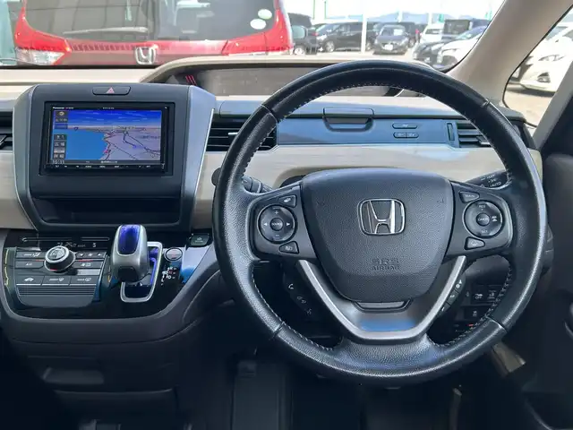 ホンダ フリード ハイブリット G ホンダセンシング 島根県 2019(令1)年 5.9万km フォレストグリーンパール 社外ナビ/CD/DVD/DTV/Bluetooth/バックカメラ/両側パワースライドドア/レーダークルーズコントロール/ビルトインETC/LEDオートライト/ステアリングスイッチ/スマートキー/プッシュスタート /レーンキープ/ステアリングスイッチ/純正17インチアルミホイール/純正フロアマット/ドアバイザー