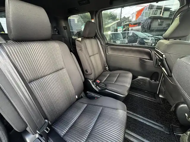 トヨタ ヴォクシー ZS 煌 熊本県 2018(平30)年 9.2万km ホワイトパールクリスタルシャイン ALPINE11インチナビ（EX11Z）/【フルセグTV/CD/DVD/Bluetooth/HDMI/ラジオ】/バックカメラ/12.8インチALPINEフリップダウンモニター/（PXH12X-R）/両側パワースライドドア/クルーズコントロール/プリクラッシュセーフティ/レーンキープアシスト/アイドリングストップ/純正16インチAW/ETC/オートライト/オートハイビーム/LEDヘッドライト/フォグランプ/横滑り防止機能/純正フロアマット/革巻きステアリング/ステアリングスイッチ/保証書/取扱説明書