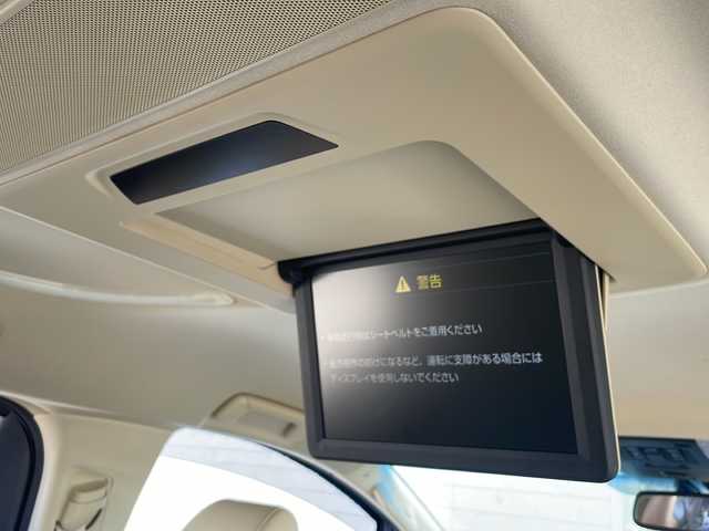 トヨタ アルファードハイブリット G Fパッケージ 富山県 2015(平27)年 11.7万km ホワイトパールクリスタルシャイン 4WD/純正フリップダウンモニター/JBLプレミアムサウンドシステム/純正メーカーナビ/フルセグ/ETC/ドライブレコーダー/トヨタセーフティセンス/衝突被害軽減ブレーキ/レーンキープアシスト/レーダークルーズコントロール/パノラミックビューモニター/パワーバックドア/クリアランスソナー/オートマチックハイビーム/本革シート/シートヒーター/ステアリングヒーター/AC100V/1500W