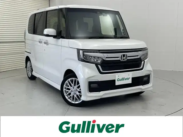 ホンダ Ｎ ＢＯＸ カスタム L ターボ 茨城県 2022(令4)年 2.9万km プラチナホワイトパール 社外ナビ/バックカメラ/フルセグ/社外後席モニター/衝突被害軽減ブレーキ/車線逸脱抑制装置/レーダークルーズコントロール/オートマチックハイビーム/ソナー/両側電動スライドドア/ETC/ドラレコ/シートヒーター/純正15インチAW/LEDヘッドライト/スマートキー